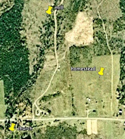 Close-up of Thibodeau village, grass growth patterns showing location of stone  walls around 4 family homesteads, 2 in front by road, 2 behind.